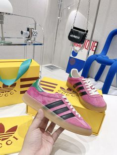 Gucci x Adidas Women’s Gazelle Sneaker Pink For Women Gucci Adidas Gucci Gazelle Pink, Gucci Designer Pink Sneakers, Pink And Yellow Gazelle, Pink And Green Gazelles, Pink Gucci Bag With Branded Hardware, Gucci Monogram, Sportswear Brand, Adidas Gazelle, Gucci Shoes