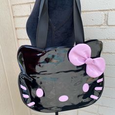 Brand New Never Worn Trendy Hello Kitty Shoulder Bag, Trendy Hello Kitty Pouch Bag, Trendy Black Shoulder Bag With Cat Design, Hello Kitty Pink Shoulder Bag For Travel, Pink Hello Kitty Shoulder Bag For Travel, Everyday Pink Bag With Cat Design, Trendy Black Bag With Hello Kitty Print, Cute Black Bag With Removable Pouch, Cute Black Shoulder Bag With Removable Pouch