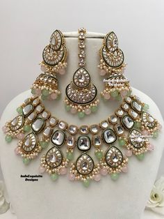 Premium quality Kundan Necklace comes with elegant Jhumki Earrings and Tikka/ trendy Indian bridal set/Premium Quality Polki and Kundan Jewelry/pink pista/pink mint/pink sage green  All items are shipped from Brampton, Ontario, Canada. If you need your item by a certain day, please reach out to us for express delivery option before placing the order so that we can update the shipping for you. Standard shipping/delivery timeline Below are the delivery timeline estimates. We dispatch all orders by Wedding Jewellery Designs, Brampton Ontario, Indian Wedding Jewelry Sets, Kundan Necklace Set, Necklace Set Indian, Kundan Jewelry, Fancy Jewellery Designs, Jhumki Earrings, Indian Jewelry Sets