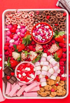 valentine's day snack tray with pretzels, marshmallows, and strawberries