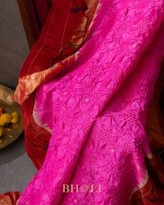 Add a touch of quirky elegance to your wardrobe with our Handtied bandhini Authentic Pure Silk handwoven mor-tota Yeola Paithani in rani pink. Made from luxurious silk, this bandhini piece is sure to make a statement with its playful color and traditional handwoven design. Perfect for any special occasion. (Limited quantities available!) Pink Chikankari Embroidered Dupatta In Slub Silk, Pink Cotton Silk Traditional Wear With Dupatta, Pink Slub Silk Dupatta For Transitional Season, Pink Cotton Silk Traditional Wear For Transitional Season, Transitional Pink Cotton Silk Traditional Wear, Pink Cotton Silk Traditional Wear For Festive Season, Festive Pink Cotton Silk Traditional Wear, Pink Cotton Silk Traditional Wear For Navratri, Navratri Pink Cotton Silk Traditional Wear