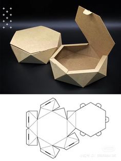 an open box with the lid cut out to look like hexagonal shapes, sitting on a black surface