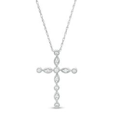 Glistening with vintage inspiration, this diamond cross pendant is destined to be treasured. Created in sterling silver, this sentimental design showcases shimmering diamonds in intricate milgrain-lined bezel settings alternating with marquise shapes adorned with diamonds and milgrain borders along a cross shape. Captivating with 1/8 ct. t.w. of diamonds and a bright polished shine, this suspends along an 18.0-inch rope chain that secures with a spring-ring clasp. Diamond White Cross Necklace With Diamond Accents, Anniversary Diamond Cross Necklace With Accents, Classic Diamond White Cross Necklace, Anniversary Cross Diamond Necklace With Accents, Classic Diamond Accents Cross Pendant Necklace, Classic Cross Necklace With Diamond Accents, Classic Cross Diamond Necklace With Accents, Classic Diamond Cross Necklace With Accents, Classic Diamond White Crucifix Cross Necklace