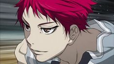 an anime character with red hair and black eyes looking at something in the distance behind him