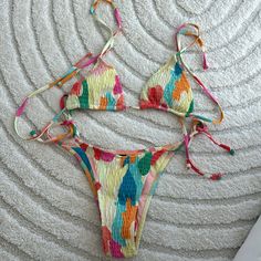 Brand New With Tags Size Medium Pretty Pattern Top Has Removable Pads Smocked Material Multicolor Drawstring Swimwear For Vacation, Multicolor Swimwear With Drawstring For Vacation, Multicolor Summer Swimwear With Drawstring, Multicolor Drawstring Swimwear For Summer, Multicolor Drawstring Swimwear For Beach Party, Multicolor Drawstring Swimwear For Sunbathing, Multicolor Swimwear With Drawstring For Sunbathing, Multicolor Drawstring Swimwear For Beach Season, Multicolor Stretch Swimwear With Drawstring