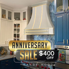 a kitchen with blue cabinets and an advertisement for the range hood anniversary sale up to $ 40 off