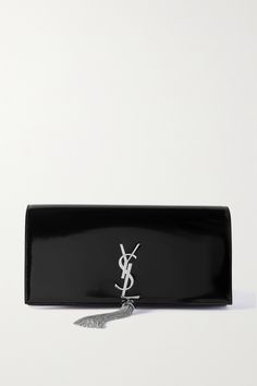 A clutch as sleek and streamlined as SAINT LAURENT's 'Kate' style will make a timeless addition to your evening wardrobe. Crafted from leather that has a glossy finish, it's adorned with the label's signature silver-tone plaque anchored by chain tassels. There's enough space inside for your phone, cards and lipstick. Purse Wishlist, Black Clutch Purse, Ysl Purse, Ysl Kate, Ysl Clutch, Kate Bags, Clutch Purse Black, Dream Bags, Black Evening Bag