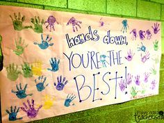 a sign with hand prints on it that says, hands down you're the best