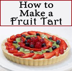 a fruit tart on a white plate with the words how to make a fruit tart