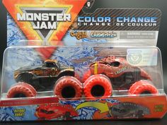 two red monster trucks are in the package