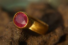 24k gold ruby ring//24k gold ring//solid gold ring//red gem ring//24k gold artisan ring//one of a kind//solid gold and ruby ring this one of a kind ring. 24k gold with the beautiful ruby gem stone i have collected from all over the world. gems are very fine quality. the ruby is 12X10 mm the thickness of the shank is 1.4 mm the wide of the shank 6 mm if you like real artistic jewelry this one is for you. The jewelry will be packed in a gift box and is ready to give as a gift. Your item will be sh Red 22k Gold Rings For Gift, 22k Gold Ruby Ring Gemstone For Gift, 22k Gold Ruby Gemstone Ring As Gift, Handmade Ruby Ring In Yellow Gold, Red Gem Ring, Gold And Ruby Ring, Gold Ruby Ring, Rubin Ring, Ruby Ring Gold