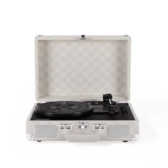 an open suitcase with a record player and turntable in it on a white background