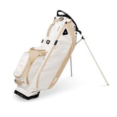 a golf bag sitting on top of a white floor