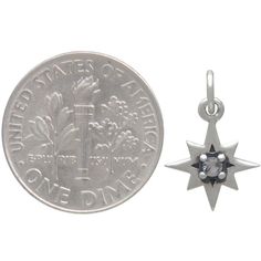 Light up your jewelry designs with this sterling silver 8 point star charm with a nano gem at the center. The shimmer and shine of this star charm adds just the right finishing touch to your jewelry line. Great for earrings and charm necklaces. Length measurement includes the 5 mm soldered jump ring. 8 Point Star, Compass Pendant, Travel Charms, Shimmer And Shine, Monogram Jewelry, Mini Charm, Charm Necklaces, Celestial Jewelry, Feather Charms