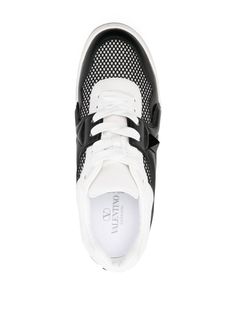 black/white panelled design mesh design leather trim logo-print tongue stud embellishment logo print to the side branded insole leather lining flat rubber sole front lace-up fastening This item is in size 42 and the color is Designer Sports Sneakers With Perforations, Designer Sneakers With Perforations For Sports, Designer Sports Sneakers With Studded Rubber Outsoles, Tongue Stud, Valentino Garavani Sneakers, Valentino Rockstud, White Paneling, Mesh Design, Sneakers Online