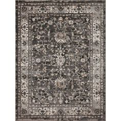 an area rug with grey and white colors