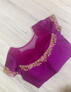 Beautiful deep magenta color pure raw silk blouse with high neck , semi circle net on the back half way through, with gorgeous antique gold embroidered for the neckline, sleeves and back. Cutwirk on the sleeves and front neckline. Size 40 with extra 2 inch margin to open Great for parties, festivals,  weddings or formal dinners You may pair it with any plain saree or textured saree to elevate the beaof this blouse!  DM if you have any questions. Back Net Embroidery Blouse, Plain Net Blouse Designs, Magenta Blouse Designs, Designer Gold Embroidered Blouse Piece, Party Blouse With Intricate Embroidery On Chanderi, Party Chanderi Blouse With Intricate Embroidery, Anarkali Gold Blouse With Intricate Embroidery, Gold Anarkali Blouse With Intricate Embroidery, Diwali Gold Embroidered Saree