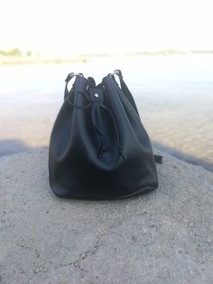 "Handmade Real Leather Bucket Bag in natural biege color Dimensions the bags: Height: 30.0cm (11.8\") Base: 29.0 x 17.0cm (11.4\" x 6.7\") Max. Strap Length: 127.0cm (50\") All Bags are made to order. If you like this bag, please see our full collection in the below link: https://www.etsy.com/shop/madammeshushusection_id=17490770&ref=shopsection_leftnav_3 Dear Visitor Welcome to my store where you will find simple, comfortable and absolutely stylish Greek Summer Sandals and colourful handbag Gift Bucket Satchel With Dust Bag, Leather Hobo Pouch Bag As Gift, Leather Bucket Shoulder Bag With Dust Bag, Soft Leather Pouch For Daily Use, Everyday Leather Handle Pouch Bucket Bag, Soft Leather Pouch Bag For Everyday, Gift Bucket Bag With Dust Bag, Everyday Bucket Tote Bag With Dust Bag, Leather Handled Pouch Bucket Bag For Everyday Use