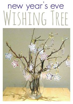 a new year's eve wish tree is displayed in a vase