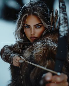 a beautiful young woman holding an arrow in her hand and looking at the camera while wearing winter clothes