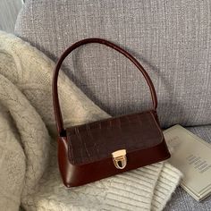 SPECIFICATIONSTypes of bags: Shoulder HandbagsStyle: vintageShape: BaguettePlace Of Origin: GUANG DONG ProvincePlace Of Origin: GUANG DONG ProvincePattern Type: SolidOrigin: CN(Origin)Occasion: VersatileNumber of Handles/Straps: SingleModel Number: 69633Main Material: PULining Material: PolyesterInterior: No PocketHardness: SoftHandbags Type: Shoulder BagsGender: WOMENClosure Type: COVERCN: GuangdongBrand Name: DKQWAIT Classy Handbags, Trending Bags, Purse Aesthetic, Aesthetic Designer, Viral Products, Shein Women, Black Gift Bags, Bags Fabric, Women Products