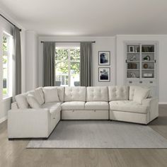 a large white sectional couch in a living room