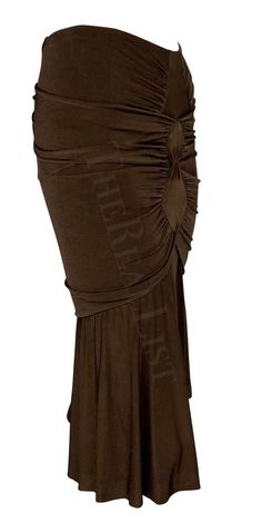 For Sale on 1stDibs - Presenting a brown stretch viscose blend skirt designed by Tom Ford for Yves Saint Laurent Rive Gauche's Spring/Summer 2003 collection. The beige/taupe Fitted Brown Ruched Bottoms, Fitted Brown Pencil Skirt For Summer, Tom Ford Runway, Rive Gauche, Skirt Design, Tom Ford, Yves Saint Laurent, Saint Laurent, Spring Summer