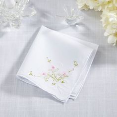 Indulge in the exquisite charm of the Delicate Floral Embroidery Handkerchiefs. Each handkerchief is a testament to artistry, featuring intricate floral designs meticulously embroidered with care. Whether tucked into a suit pocket or delicately held, these handkerchiefs elevate any occasion with their timeless elegance. Perfect as thoughtful gifts or personal indulgences, they capture the essence of refined style and classic beauty. Embrace sophistication with every gentle fold and flutter of th Flower-shaped Embroidered Handkerchiefs For Gifts, Flower Shaped Embroidered Handkerchiefs For Gift, Embroidered Flower Handkerchiefs As Gift, Embroidered Flower Handkerchiefs For Gifts, White Embroidered Flower-shaped Handkerchiefs, White Embroidered Flower Shaped Handkerchiefs, Traditional Floral Embroidered Handkerchiefs As Gift, Elegant Wedding Handkerchiefs With Embroidered Border, Elegant White Floral Embroidered Handkerchiefs