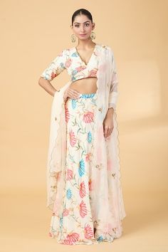 Off white yoke blouse with floral print and aari, zardosi embroidery. Paired with coordinating lehenga and scallop hem dupatta. - Aza Fashions Cape Lehenga, Zardosi Embroidery, Kurta Lehenga, Lehenga Pattern, Lehenga Skirt, Silk Organza, White Silk, Indian Designer Wear, Bridal Lehenga