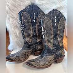 Questions? Leave A Comment Below! Vintage Corral Western Boots! Cross And Angel Wings!! Black With Beautiful Accents!!! Toes Show Wear, These Are Vintage And Have Been Worn. Rodeo Season Is Coming!! Grab Your Boots!! Size 10 Black Snip Toe Country Boots, Country Style Black Boots With Snip Toe, Country Style Black Snip Toe Boots, Black Country Style Boots With Round Toe, Country Style Black Round Toe Boots, Cowboy Boots Women, Vintage Shoes, Black And Tan, Western Boots