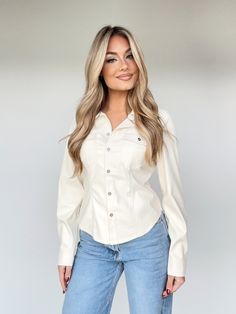 This Sleek Button Down Top is the perfect mix of style and comfort. Crafted from faux leather and featuring pocket details and button closures, this top is sure to make a statement. It is fitted and elevated, making for a trendy, yet versatile look. Its cropped length is chic and perfect for any brunch date, dinner, drinks, and shopping. Make it your go-to this winter. 100% Polyurethane Do not wash. Dinner Drinks, Brunch Date, Date Dinner, Pocket Detail, Dresses Xs, Button Downs, Button Down Shirt, Faux Leather, Sleek