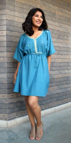 "Boho dress for women, Turquoise linen dress, Bohemian dress, Linen kaftan, Made to order, Custom made, Plus size -Model height: 5'3\" wearing size S -Length: 34\" neckline has sequins work inspired by motif of Mughal art and embroidery. This kind of embroidery is called maggam. **Note: Free Shipping time 15-21 days. Express Shipping time 5-7 days.**" Green Linen Bohemian Dress, Blue Linen V-neck Dress For Vacation, Blue V-neck Linen Dress For Vacation, Bohemian Dresses With Back Tassel Tie-up, Bohemian Linen Mini Dress, Bohemian Linen Beach Cover-up Dress, Turquoise Tunic Dress For Vacation, Summer Tunic Dress With Back Tassel Tie-up, Blue Bohemian Linen Dress For Summer