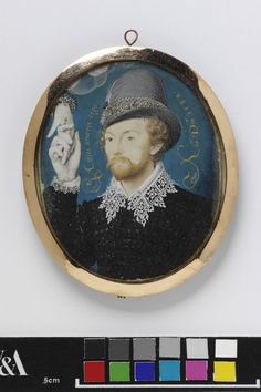 a miniature portrait of a man wearing a hat and holding a bird in his hand