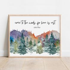 a watercolor painting with the quote, come to the woods for love is rest