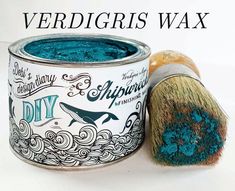 there is a blue paint in a tin with a brush next to it that says, verdigris wax