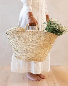 Handwoven in Marrakesh from straw, creating a beautiful herringbone texture of sturdy natural fibers, the Maelle French basket is ideal for carrying groceries, laundry and other daily essentials. Material: Palm Leaves Market Basket Bag, Boho Style Living, French Basket, Moroccan Pouffe, Moroccan Basket, French Market Basket, Beautiful Slippers, Herringbone Texture, French Baskets