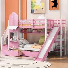 a child's bedroom with pink bunk beds and slide in the middle, white rug on the floor