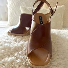 These Are Some Beautiful Brand-New, Never-Used Zara Platform Sandals. They Are Very Casual And Can Be Combined With Several Of Your Outfits. It Is Brown Leather Throughout And Beige Yarn On The Platform. The Platform Height Is 4 Inches. If You Have Any Questions Please Don't Hesitate To Ask! Chic Brown Synthetic Slingback Sandals, Summer Brown Open Heel Heels, Brown High Heel Slingback Sandals For Beach, Brown Wedge Heel Slingback Sandals For Spring, Brown Synthetic Slingback Summer Sandals, Brown Summer Heels With Removable Insole, Summer Brown Synthetic Slingback Sandals, Zara High Heel Brown Sandals, Zara Brown High Heel Sandals