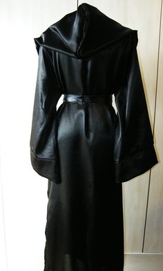 Satin Black Robe, Long Hooded Robe, Ritual Robe, Black Witch Robe with satin ribbon-belt, Grim Reaper costume, Mage robe, Wizard tunic, Warlock dress, Ceremonial Robe Please choose size (you can use picture 9 for choosing women size chart and picture 10 for chosing men size) and color Shipping terms to USA, United Kingdom, Canada - 25-30 Days to Europe - 20-25 Days Fitted Black Robe With Long Sleeves, Robe Reference, Mage Robes, Hogwarts Robes, Priest Robes, Grim Reaper Costume, Reaper Costume, Hooded Robe, Black Witch