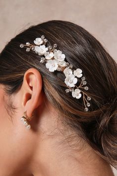 Channel undeniably romantic vibes when you finish your updo by adding the Lulus Floral Radiance Gold Beaded Flower Hair Comb! This elegant comb is plated in gleaming, gold-toned metal and features a twisted wire floral decoration, with subtle flowers and beaded accents along its twining length. 4. 5" Wide. 50% Iron, 35% Plastic Flower And Pearls, 15% Brass Wire. Imported. Lulus | Floral Radiance Gold Beaded Flower Hair Comb. Wedding Hair Combs, Beaded Hair Combs, Decorative Hair Pins, Pearl Bridal Comb, Romantic Vibes, Gold Hair Clips, Floral Accessories Hair, Plastic Flower, Flower Hair Comb