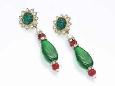 Kenneth Jay Lane Faux Emerald Crystal Earrings Rare Kenneth Lane faux emerald & crystal drop earrings. Vintage book piece, featured in “Faking It”. This is a copy of the earrings made for Jackie Kennedy. Approximate Measurements: Length 3" Condition: Very Good Faking It, Emerald Crystal, Book Pieces, Genuine Love, Jewelry Boards, Edwardian Fashion, Crystal Drop Earrings, Emerald Jewelry, Crystal Drop