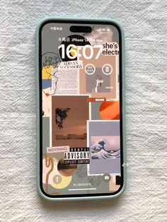 an iphone is sitting on top of a sheet of paper with images and words all over it