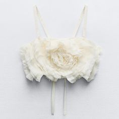 New With Tag Zara S/S 2024 Collection Straight Neck Crop Top With Straps. Textured Self-Flower Detail With Bow At Front. Back Tie Closure. Oyster-White 7200/008 Outer Shell 100% Polyester Lining 100% Polyester Which Has At Least: Outer Shell 100% Rcs-Certified Recycled Polyester Clothing Care Guide: Hand Wash Max 30c/86f Do Not Use Bleach / Whitener Do Not Iron Do Not Dry Clean Do Not Tumble Dry Cream Summer Wedding Top, White Summer Wedding Top, White Spring Wedding Top, White Wedding Top For Spring, White Zara Top For Wedding, Oyster White, Free Fashion, Zara Crop Top, Cute Crop Tops