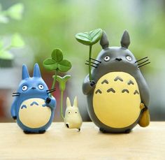 an ad for the ebay store featuring totoro and rabbit figurines