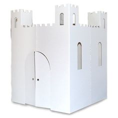 a white castle like structure with two doors