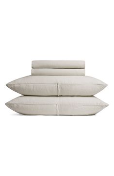 three pillows stacked on top of each other