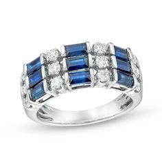 Display your smart taste in style when you wear this inviting baguette-cut blue sapphire and diamond linear triple-row ring in white gold. Crafted in 14K white gold Sideways 4.0 x 2.5mm channel-set baguette-cut bright blue sapphires alternate with shimmering 1/20 ct. round diamonds in a triple-row design. This ring captivates with 1/2 ct. t.w. of diamonds. Blue Baguette Cut Diamond Ring With Baguette Diamonds, Blue Baguette Diamond Ring, Channel Set, Baguette Cut, Bright Blue, Blue Sapphire, Round Diamonds, The Row, Sapphire