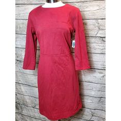 This Old Navy Sheath Dress In Solid Red Is Perfect For Any Occasion, Whether It's For Travel, Workwear, Or Business. The Knee-Length Dress Features 3/4 Sleeves And A Round Neckline With A Zip Closure. It's Made Of High-Quality Material And Is Available In Size Small. The Dress Is Stylish And Versatile, Suitable For Any Woman's Wardrobe. The Dress Is Perfect For Those Who Prefer A Simple And Elegant Style. It's A Must-Have For Any Woman Who Wants To Look Her Best. 2912 69 Red 3/4 Sleeve Dress For Work, Red 3/4 Sleeve Dress For Fall, Red Fitted Dress With 3/4 Sleeves, Navy Sheath Dress, Solid Red, Women's Wardrobe, Old Navy Dresses, Knee Length Dress, Elegant Style