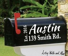 a mailbox with the name and address on it