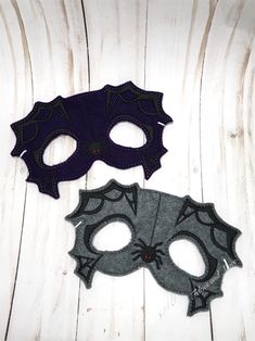 Announcement: Mel G's Felties and More has undergone a name change. The new shop name is Double B Embroidery, LLC. Our masks are perfect for fun dress up play time, photo props, and they make the perfect addition to your Halloween costume! Details ---------- This listing is for 1 spider mask that will come as pictured, ready to use. This mask is stitched on your choice of purple or gray felt and is backed with purple or gray felt for a clean, neat finish on the back. The mask has a 20 inch 1.8mm Handmade Masks For Halloween Party, Purple Eye Mask For Costume Party, Purple Mask Superhero, Women’s Spider Costume, Spider Cosplay, Spider Mask, Spider Dress, Mask Photo, Mask Halloween Costume